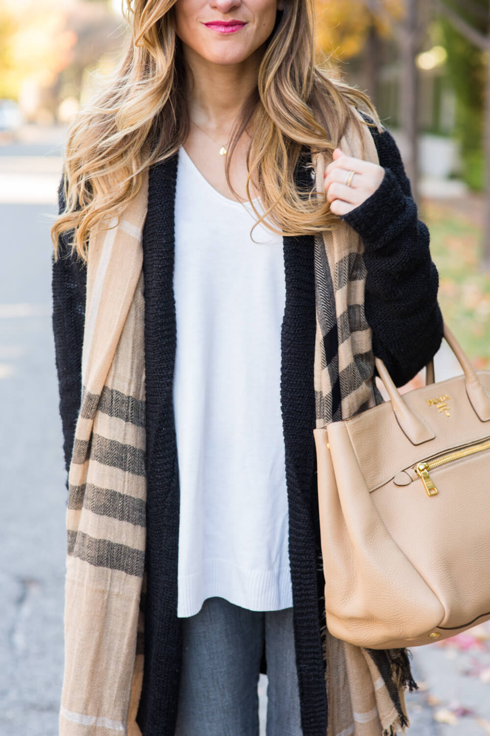 cream sweater, black cardigan, neutral scarf