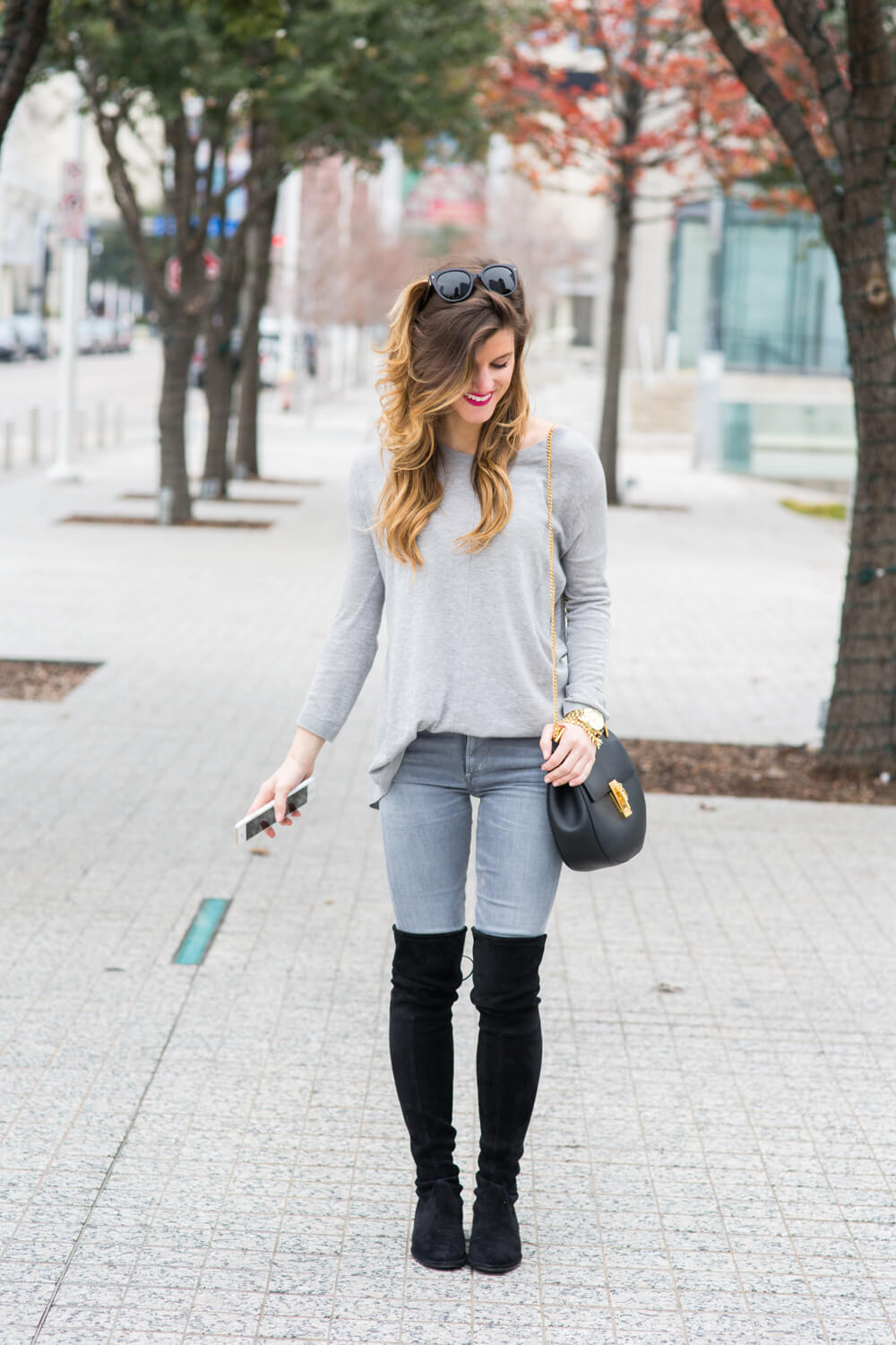 grey on grey outfit lowland over the knee boots