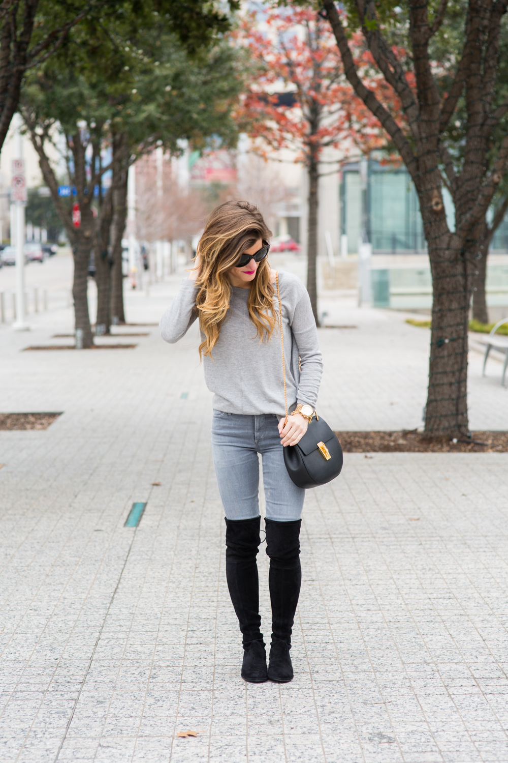 grey on grey outfit lowland over the knee boots