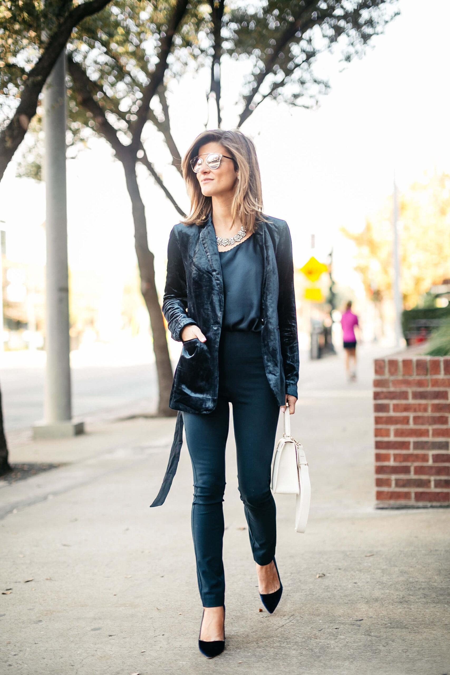 Navy jacket, camisole, blue simone pants, blue velvet pumps, and statement jewelry, dior sunglasses, white furla bag 