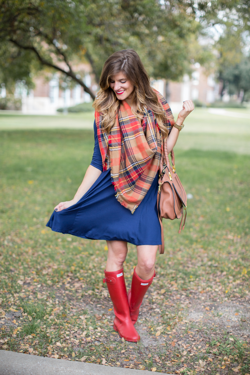 navy swing dress and blanket scarf and hunter boots rainy day outfit