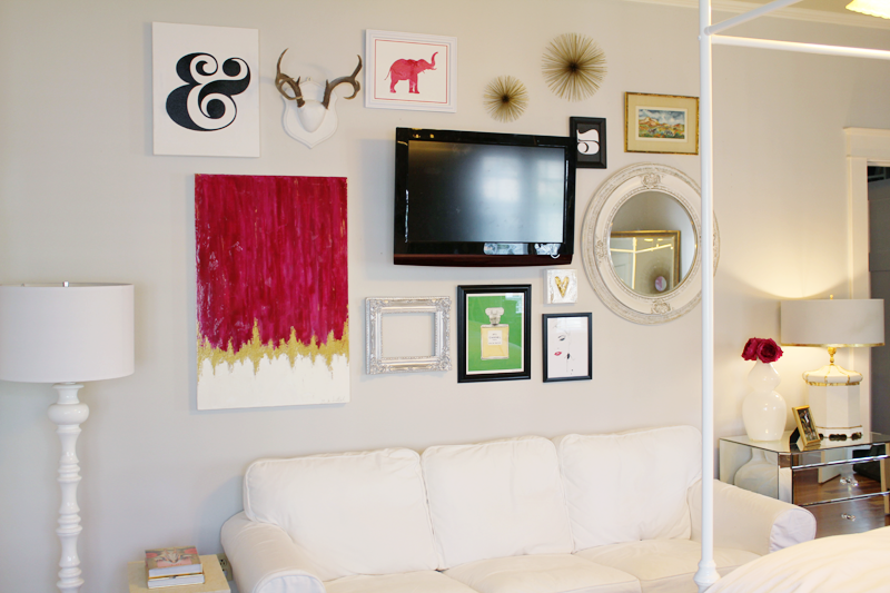gallery wall from new orleans home gallery wall with TV in center