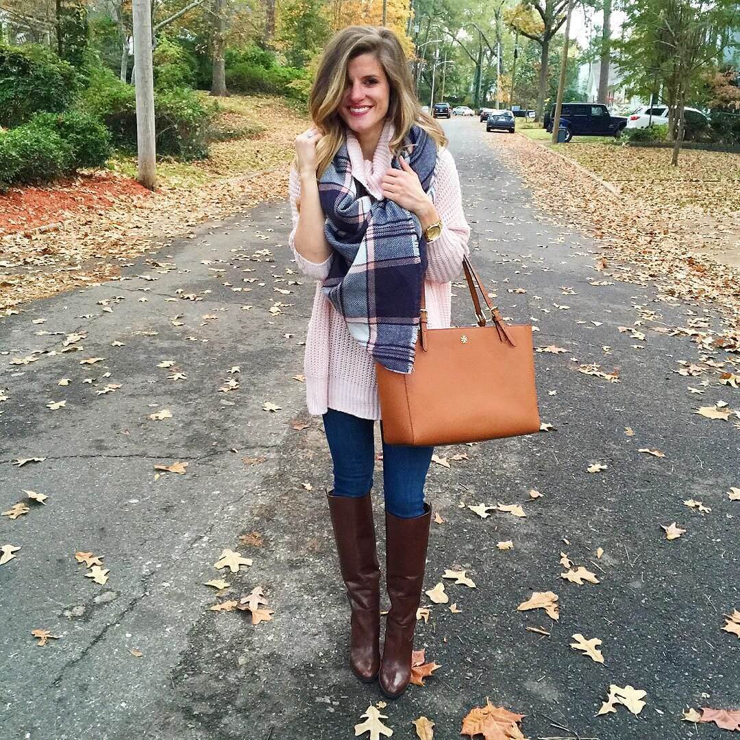 pink turtlenekc sweater, pink and navy plaid scarf, tall brown boots, tory burch york tote brightonkeller instagram outfit