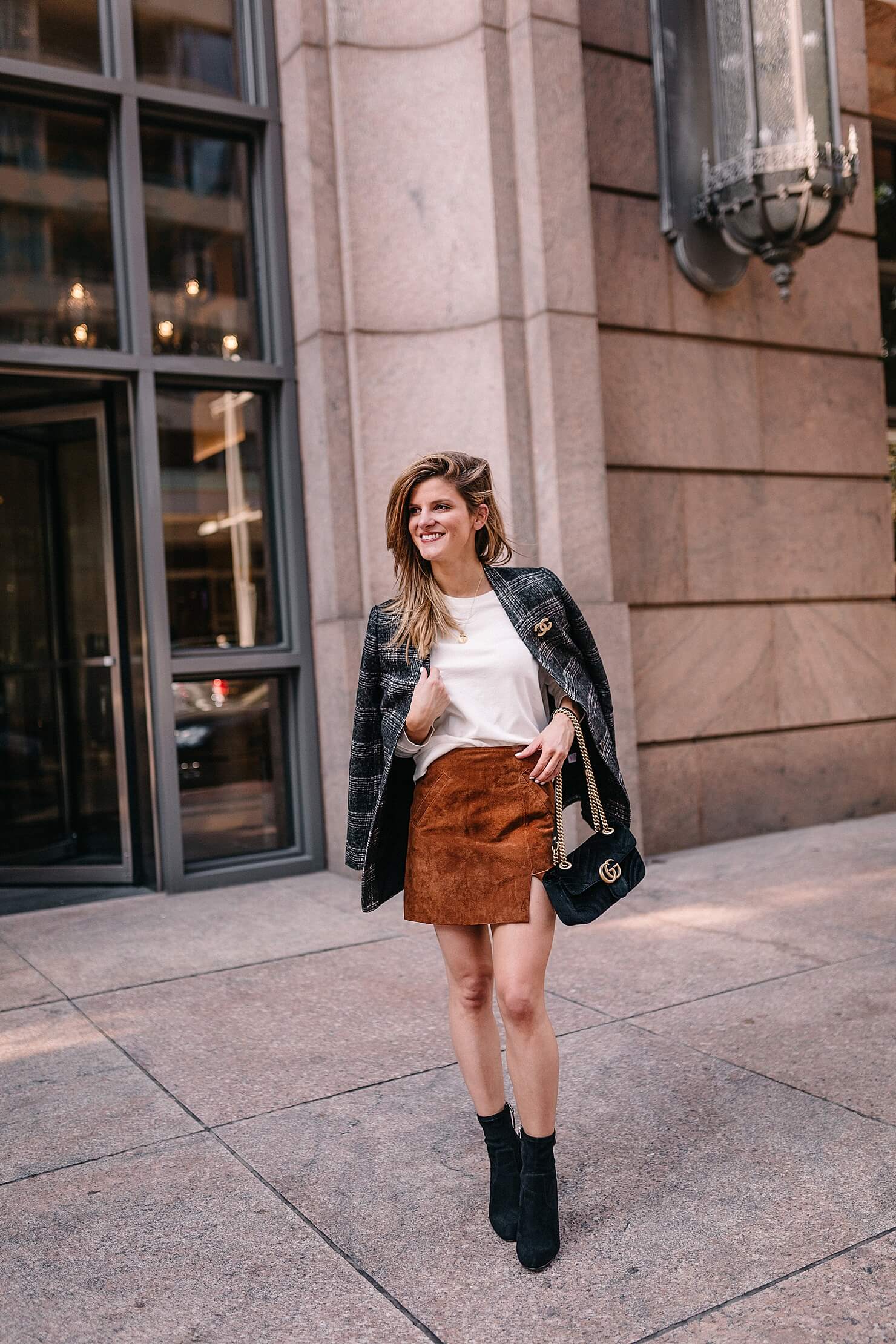 plaid blazer fall trend outfit with suede skirt and black booties