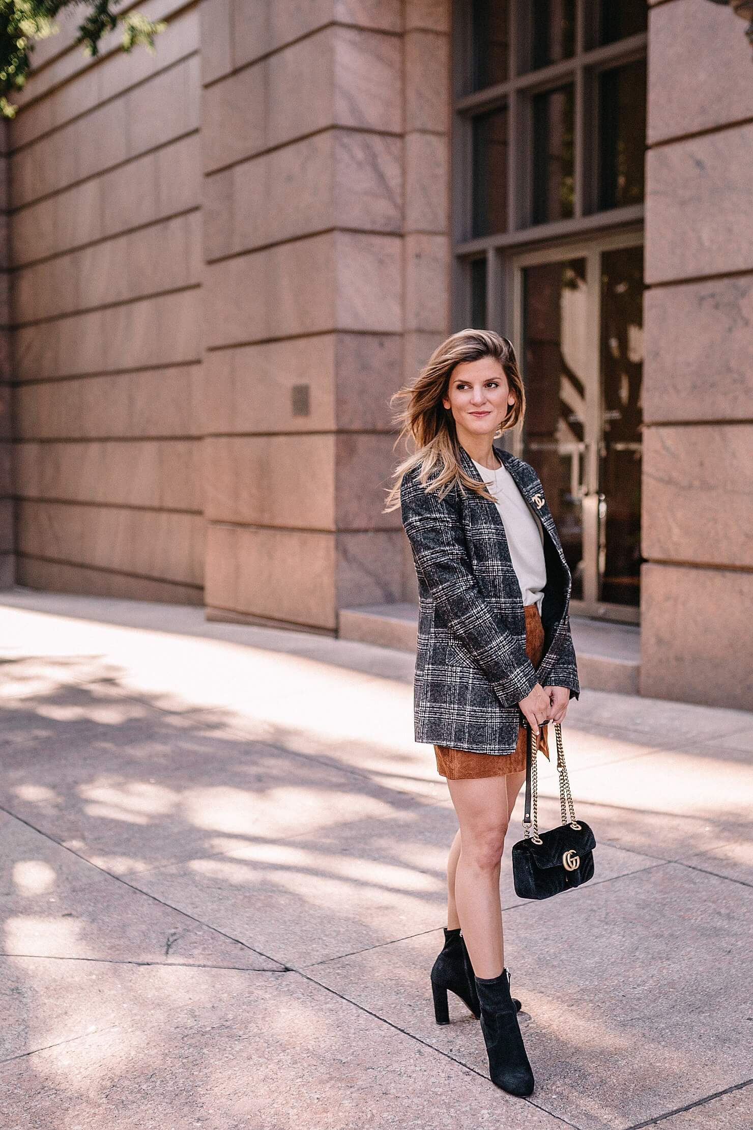 plaid blazer fall trend outfit with suede skirt and black booties