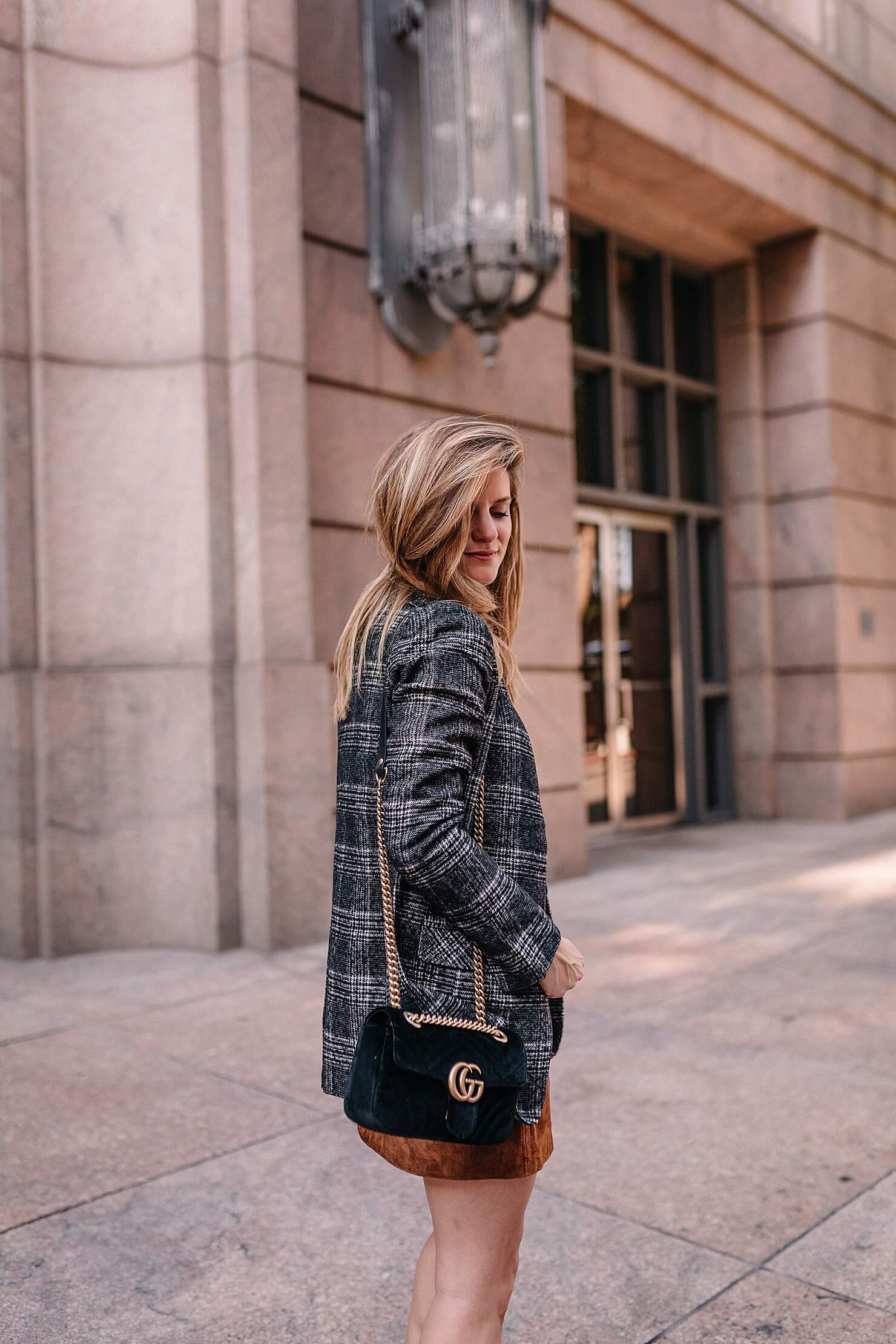 plaid blazer detail shot with gucci black velvet marmont bag