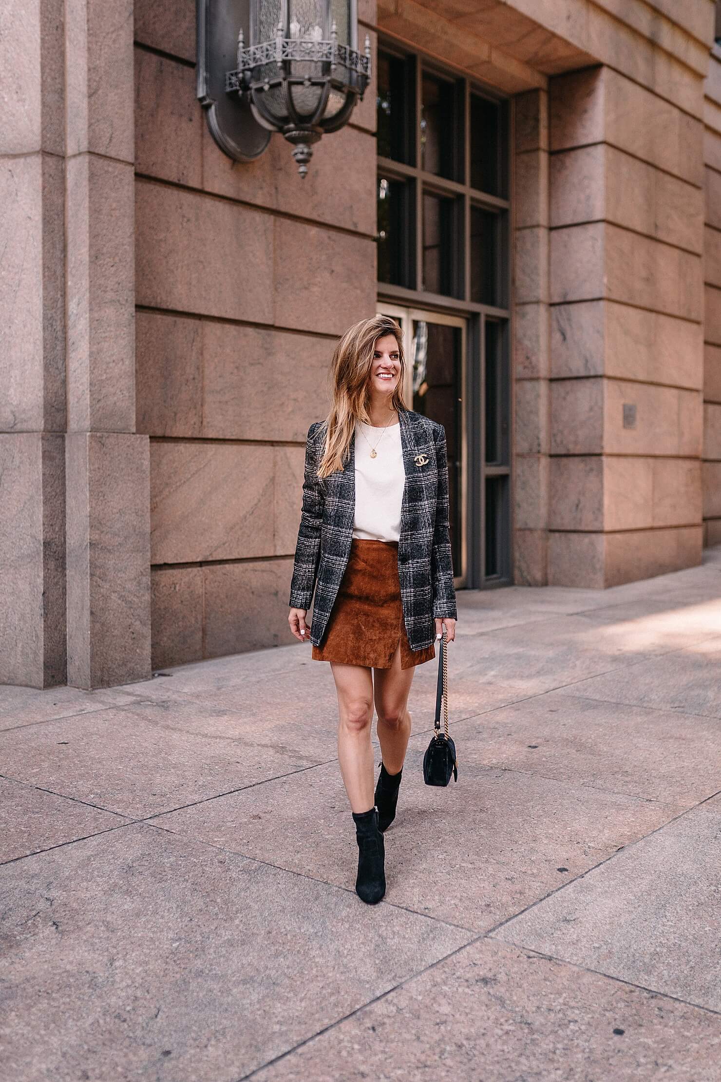 plaid blazer fall trend outfit with suede skirt and black booties