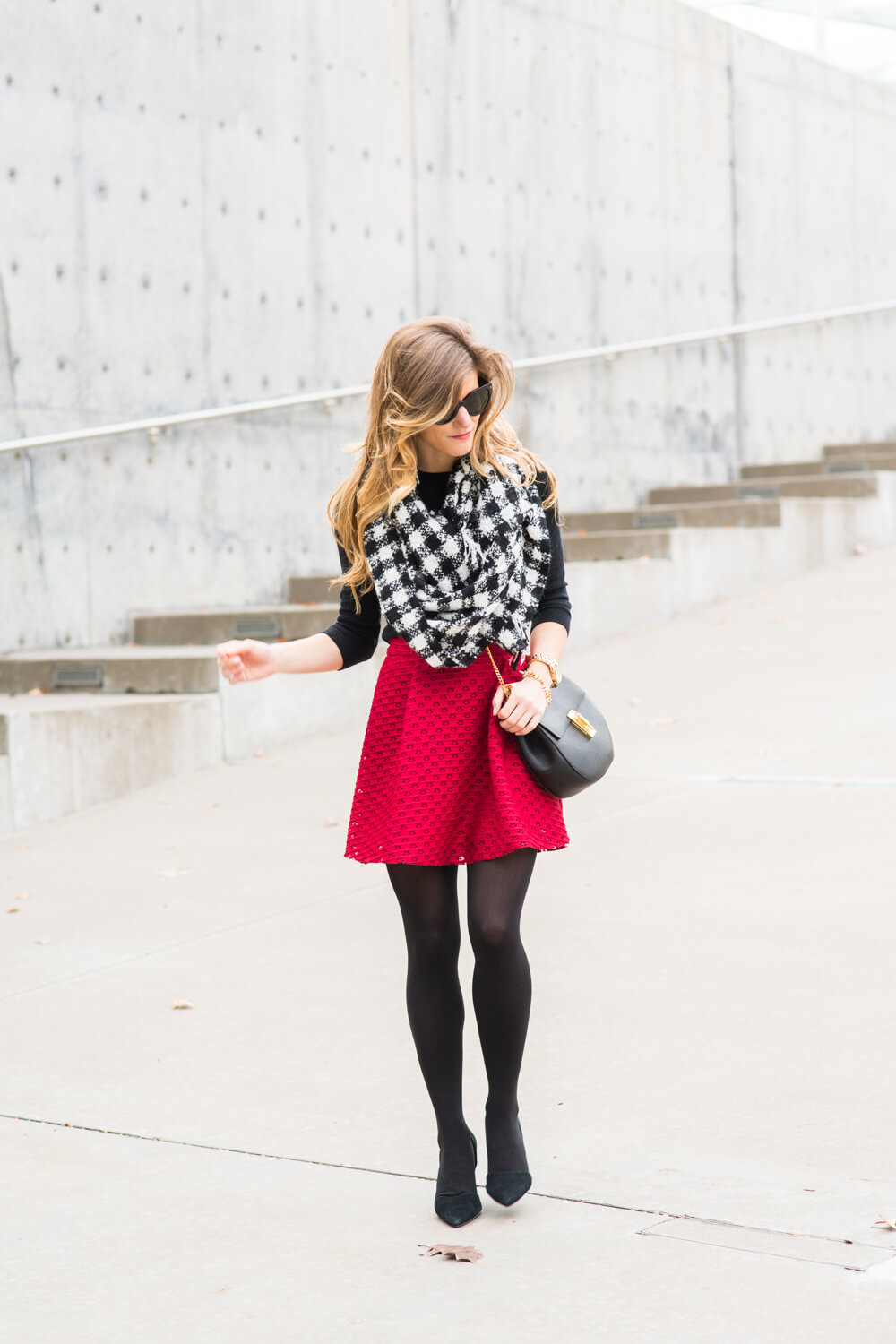 red skater skirt, black tights, black chloe drew bag