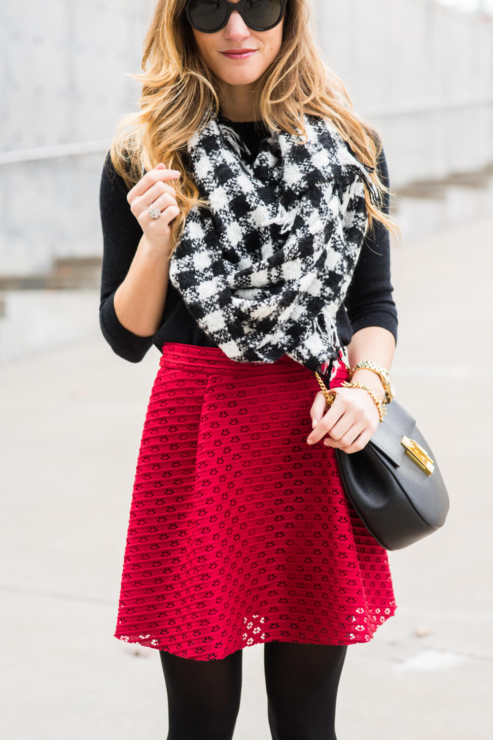 red skater skirt, black tights, black chloe drew bag