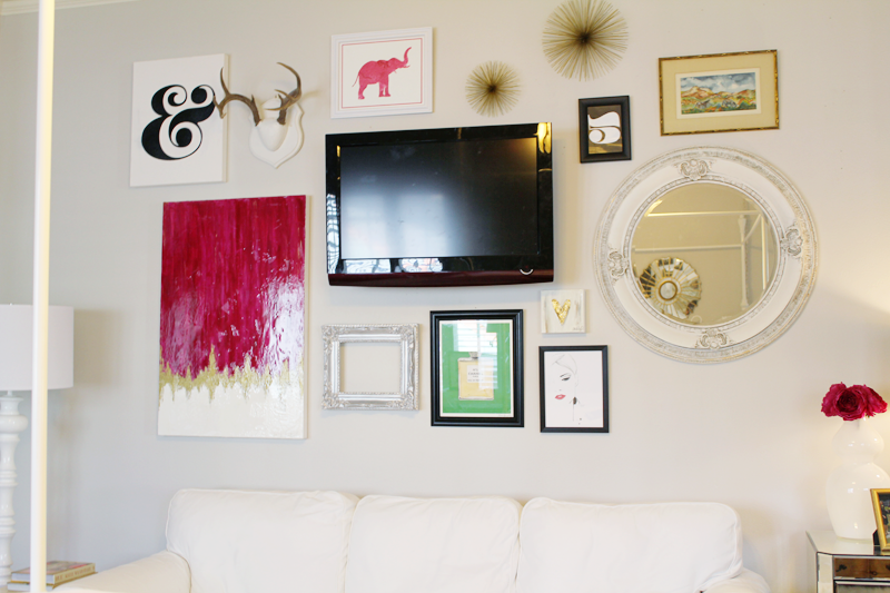 gallery wall tv in center gallery wall over couch tv in center