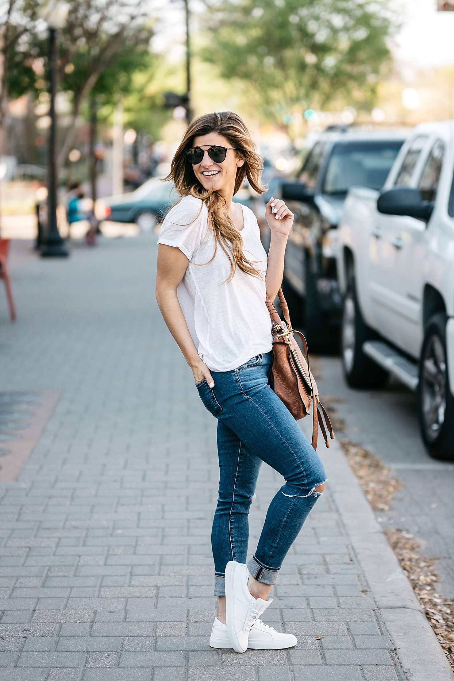 what to wear to baseball game, greats sneakers, white tee, AG distressed denim, chloe bag